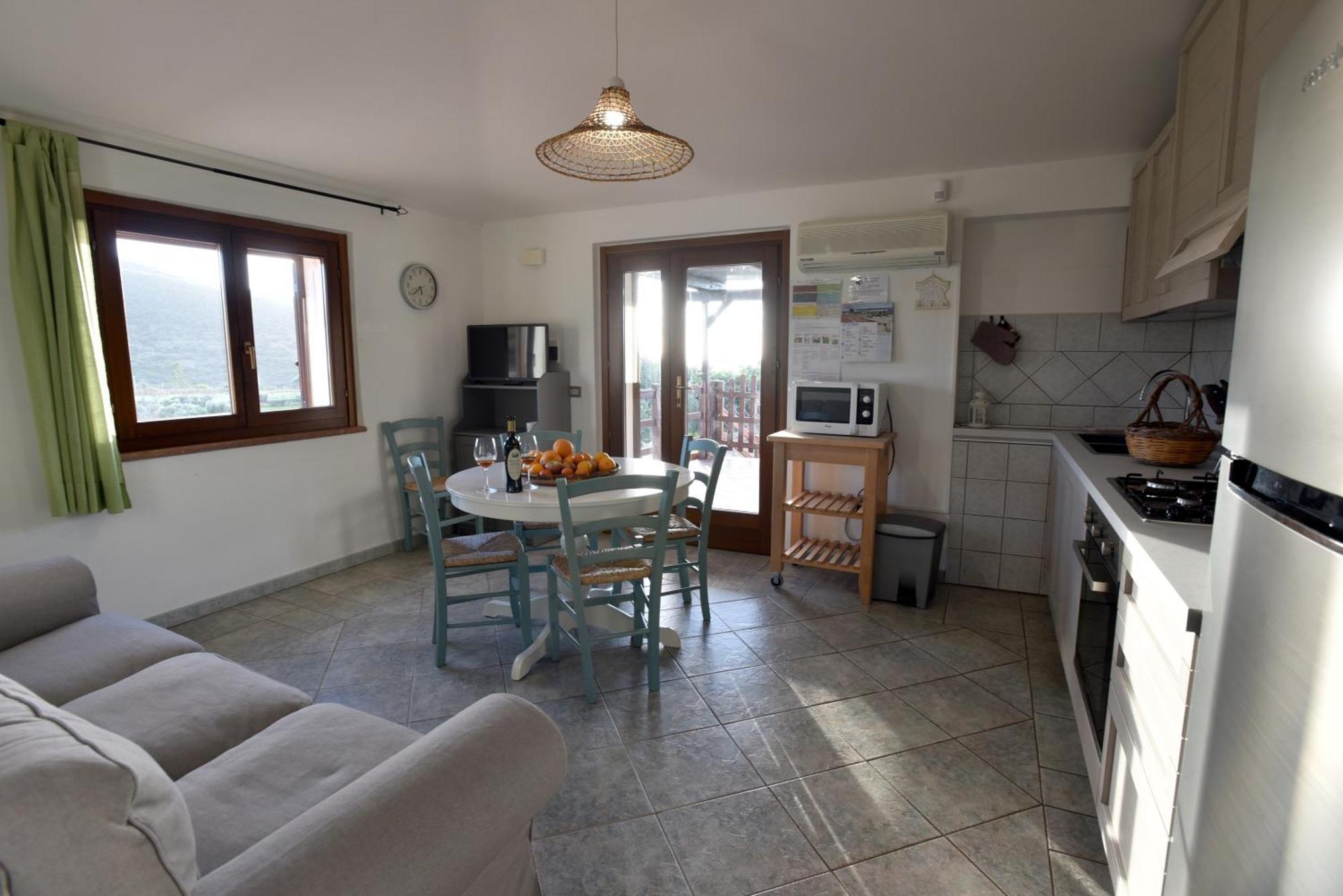 Casa Nel Vigneto Con Vista Mare Apartment Magomadas ภายนอก รูปภาพ